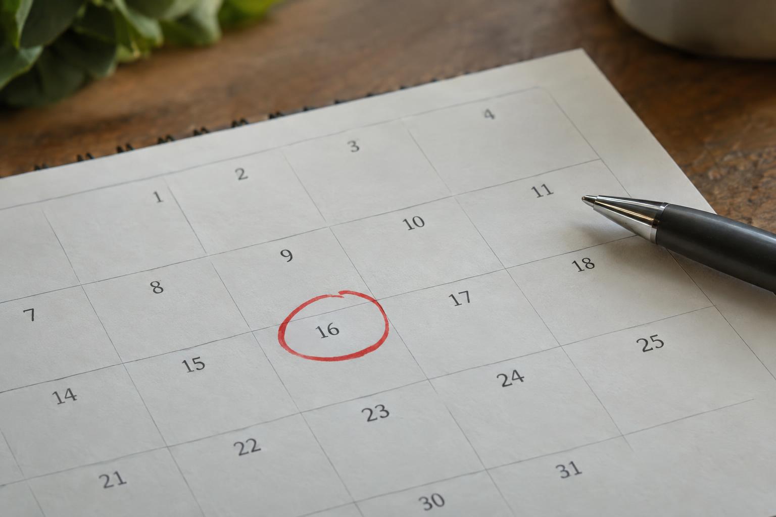 Desk calendar with a date circled in red roughly 120 days out